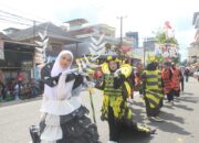 Meriah..! Pesantren Modern Khoirul Ummah Payung Guncang Karnaval Provinsi Babel 2025